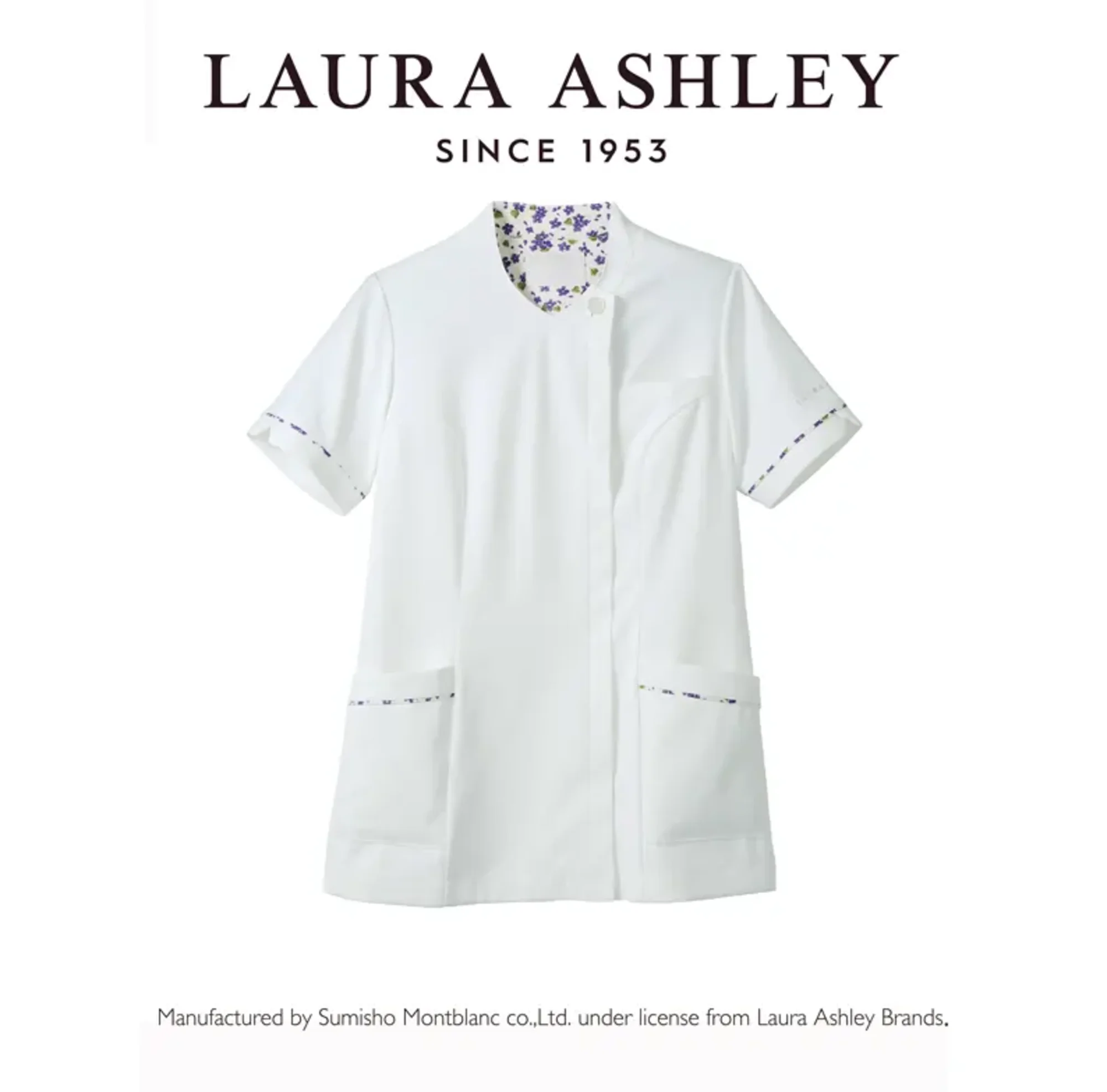 ローラ アシュレイ LW612-16 スクラブ（半袖） LAURA ASHLEY(ローラ アシュレイ)ときめきあふれる、花の彩り。英国の歴史と自然にインスピレーションを得た、ローラアシュレイの花柄プリント。その優雅な花柄を、ユニフォームに咲かせました。花々のやさしさと生命力に満ちた美しい彩りに、袖を通すたび、ときめきがあふれます。archive Violet series優しさを秘め、凛とした佇まい。英国の森林地帯の片隅に咲くすみれの花を連想させるプリントは、ローラアシュレイのアーカイブにあるアンティークテキスタイルから着想を得たデザイン。小枝や花びらが散りばめられた、躍動感のある柄が特徴です。コンパクトなVネックでさり気なく胸元をカバー。シンプルな中にこだわりを感じるスクラブ。●detail point・コンパクトなVネック。襟裏のプリント柄がチラリとのぞきます。・LAURA ASHLEYオリジナルボタン。・袖口のスリットと花柄パイピングが上質感を演出。・時計などを掛けるのに便利なウエストループ。・脇ポケットには小物の整理に便利な内ポケット付き。