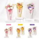 ポピー名古屋 SH-049 シャボンフラワー SH-049 シャボンフラワー置くだけで華やぐスタンドブーケシャボンがバランスよく配色されたスタンドブーケ。置くだけで場を美しく彩る高さのあるアレンジです♪font color=red>※ブーケは土台に固定されている為、取外しはできません。シャボンフラワーってどんなもの？石けん素材の花びら本物の花のような見た目で、石けん素材を使用しています。ほのかな石けんの香りやさしく香る石けんのアロマが楽しめます。枯れないから長く楽しめる水やり不要で、ずっときれいなまま飾れます。置き場所を選ばない生花がNGな場所でも安心して飾れます。プリザーブドフラワーよりお値打ち見た目は豪華なのに、価格は控えめ！注意事項シャボンフラワーは観賞用です。●手洗いには使用できません。●洗顔などお肌への使用はできません。●お風呂や洗濯など、水を使う場面でのご使用はできません。●食べられません。●香りには個体差があり、多少の強弱がある場合があります。●素材の特性上、まれにひび割れが見られることがあります。●石けん素材のため、若干の破れやキズがある場合があります。●強い負荷をかけない限り、花びらが崩れることはほとんどありません。●時間とともに変色（若干の色抜け）することがあります。 ●直射日光や湿気の多い場所での保管は変色の原因になります。●実際の商品と画像で、色合いやパーツの配置・イメージが異なる場合があります。●パッケージやラッピング仕様は、予告なく変更になる場合があります。